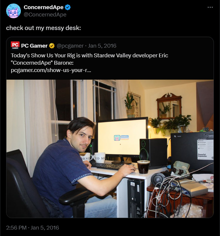 Eric Barone, developer of Stardew Valley, at his desk with his computer setup