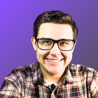 Dmitrii Afanasev from PromPixel, smiling against a purple background, representing his passion for game marketing and indie game development